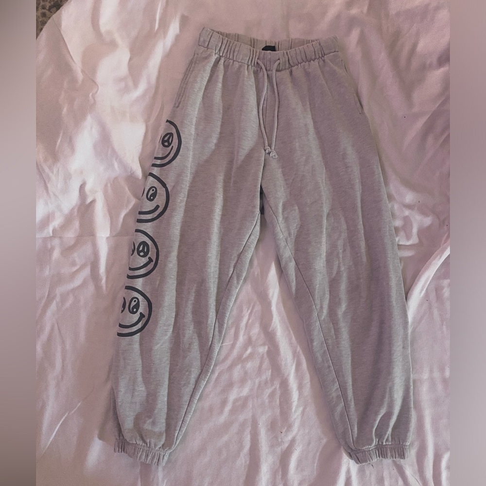 PAC sun smiley face sweats